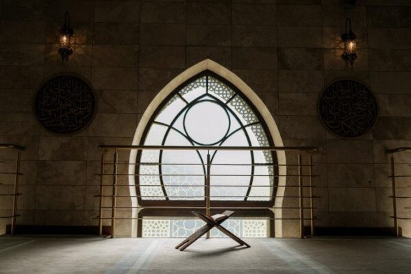 daylight coming from the arch glass window